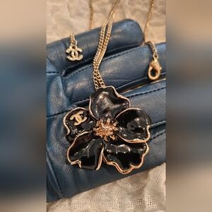 CHANEL Black and Gold Flower Pendant Necklace